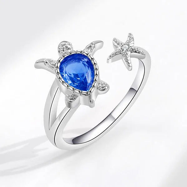 Blue alloy ring with turtle and starfish designs, women's vacation style, size 6-10