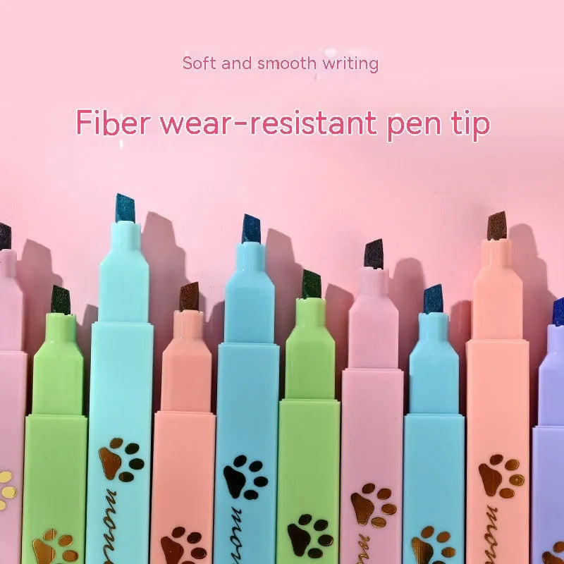 Cat's Paw fluorescent marker pen set with six colours in a plastic case, showing oblique nibs.