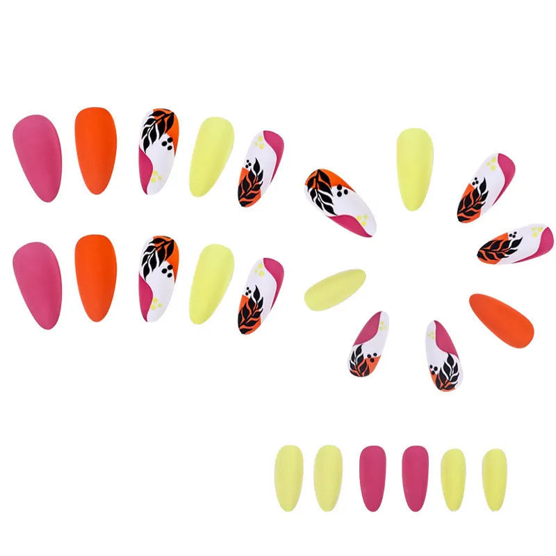 Wear Armour medium almond nail stickers showing four decorative designs including French leaves and gradient leopard print patterns