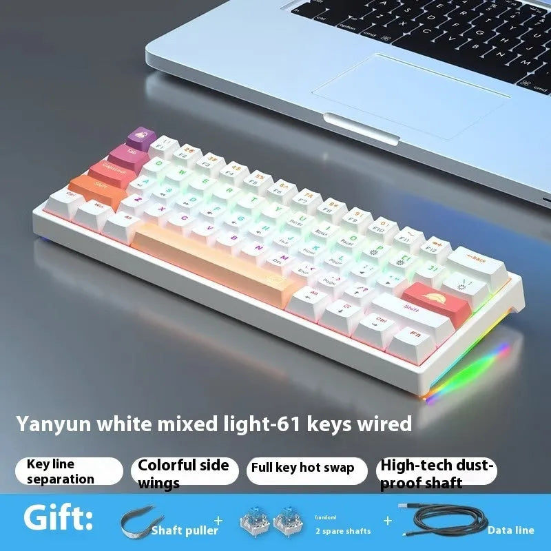 61-key bluish-black and white mechanical keyboard with hot-swap switches on desk