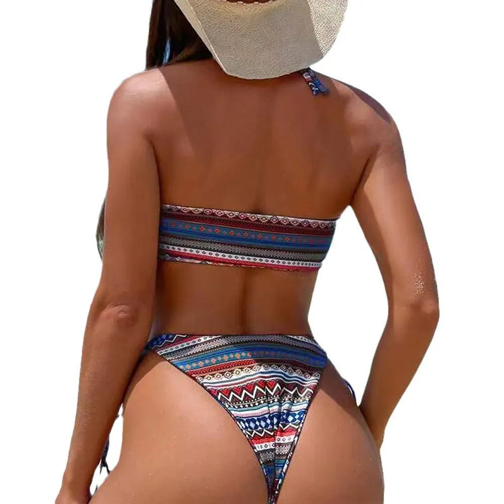 Women's halter bikini swimsuit with split briefs in polyester fabric showing colour options