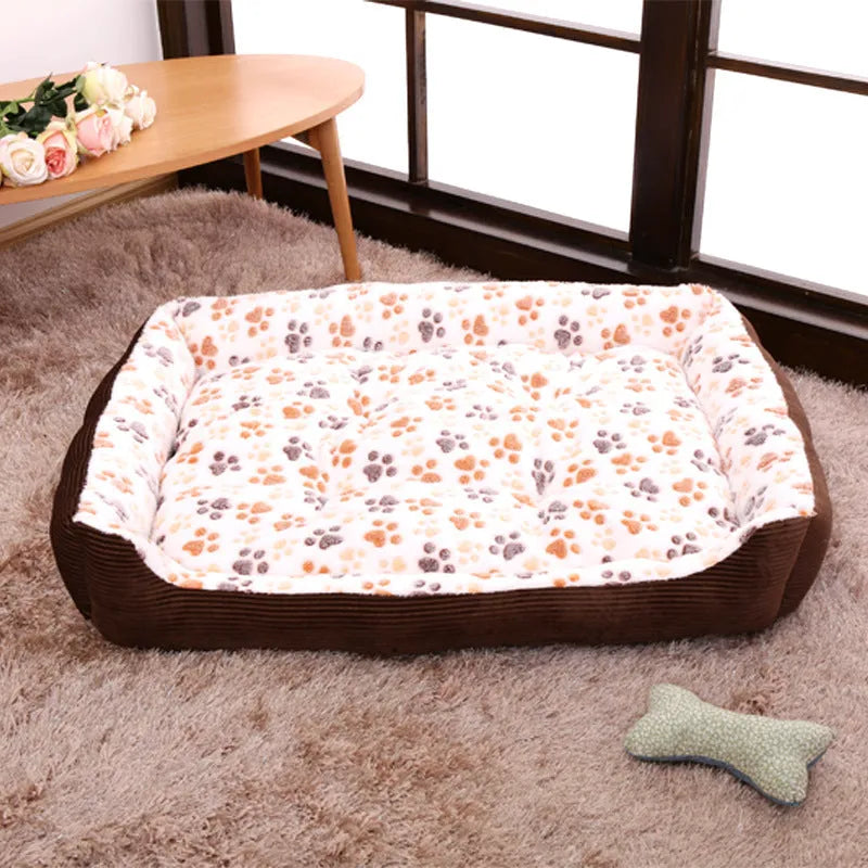 Beige plush bolster dog bed for small pets with raised sides and a removable cover.