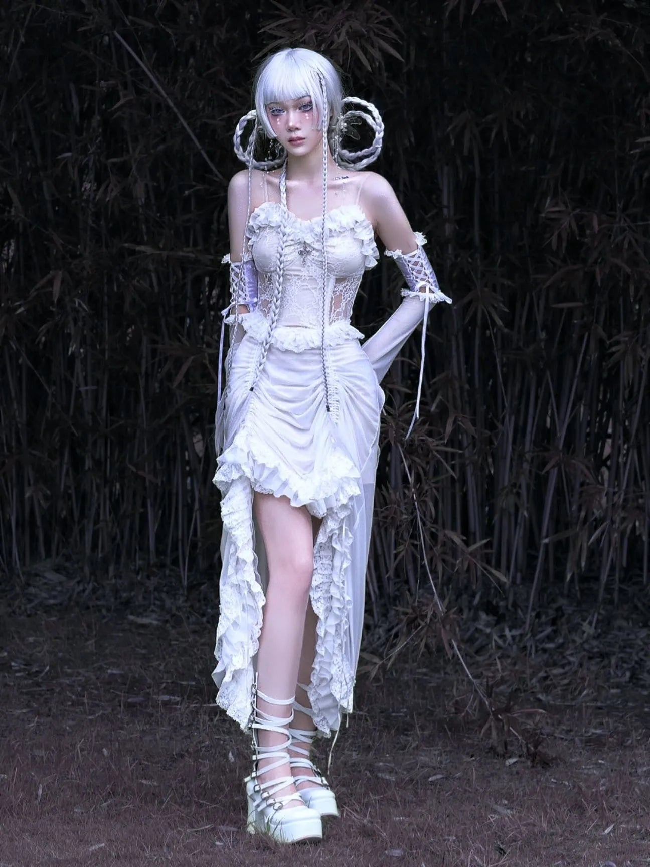 Chinese style white gothic drawstring mesh dress with dark straps and detached oversleeves on display