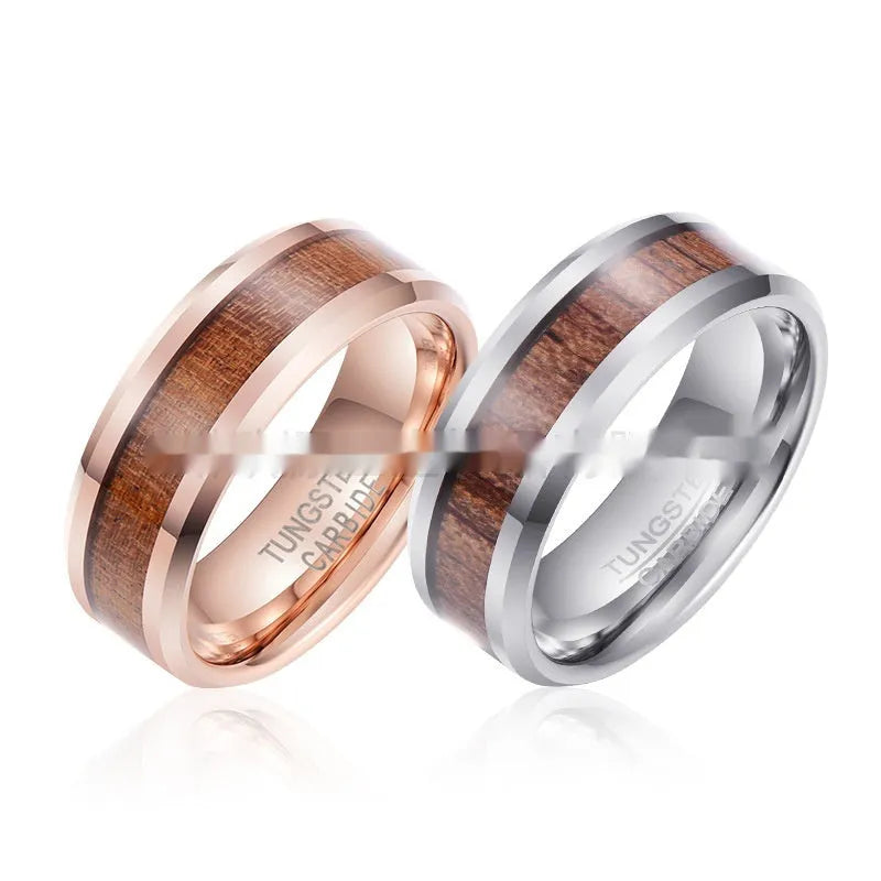 8mm wide Ugyen tungsten ring in rose gold or steel colour on a plain background.