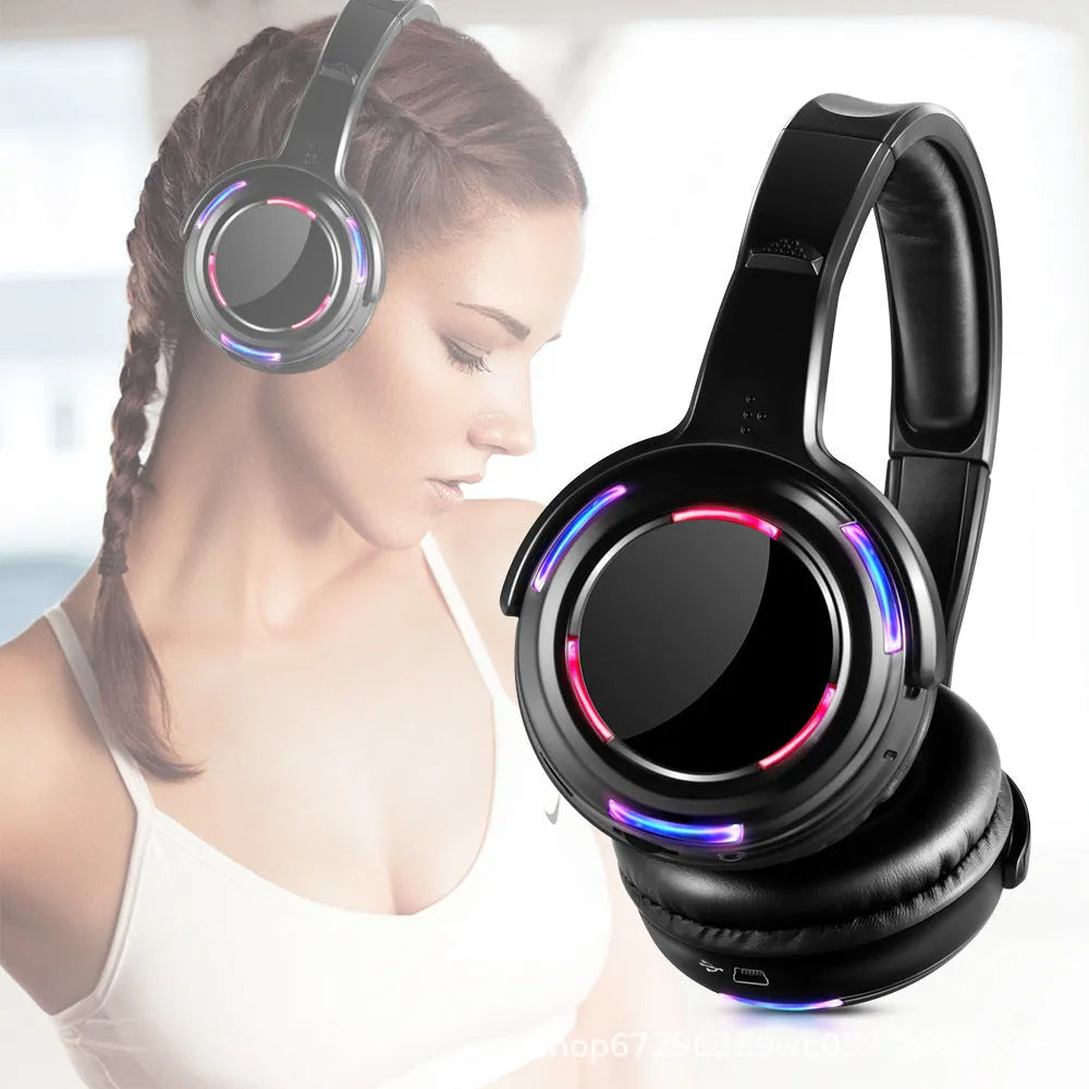 Black silent disco wireless headphones with over-ear design and built-in microphone