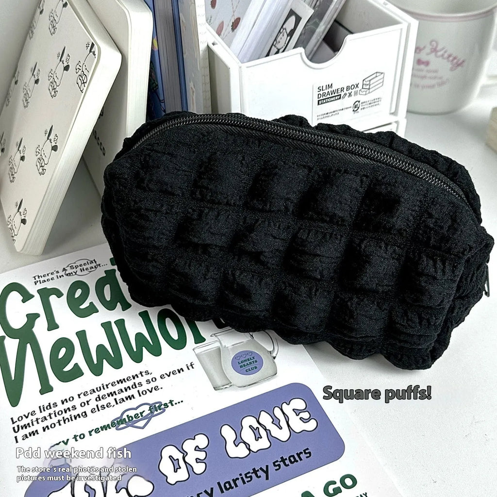 Cream puff design polyester pencil case in beige colour with zip closure