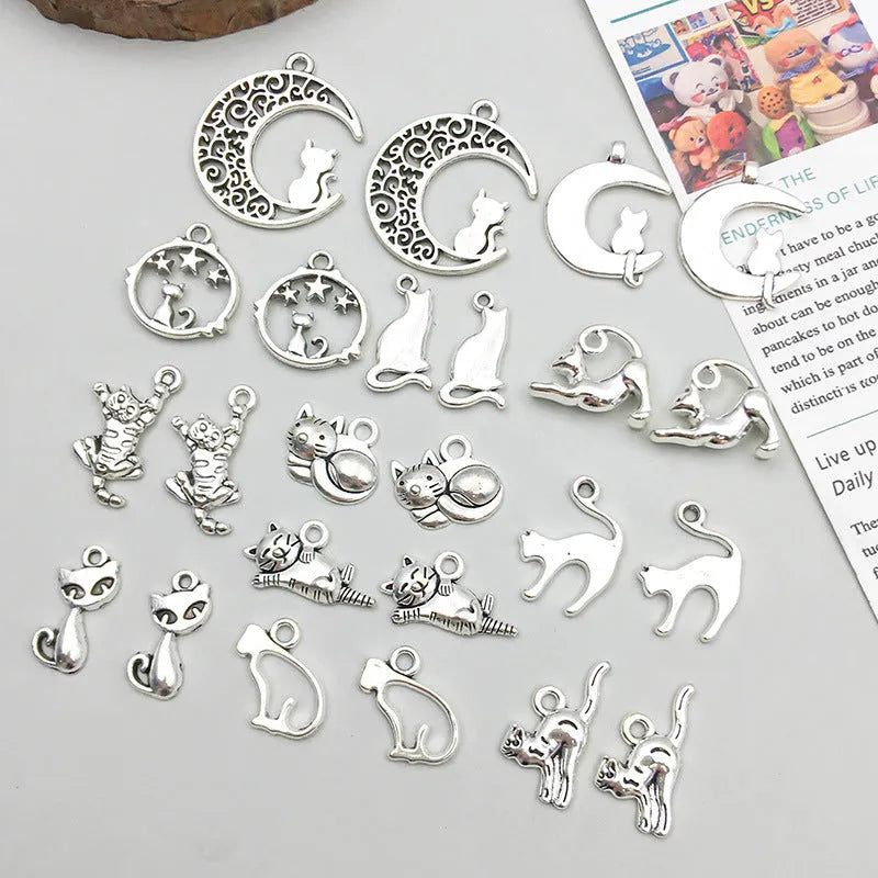 24 mixed ancient silver zinc alloy cat pendant charms with retro style on white background