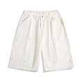 Workwear rivet cropped pants in wide-leg short style with micro-elastic waistband in apricot colour