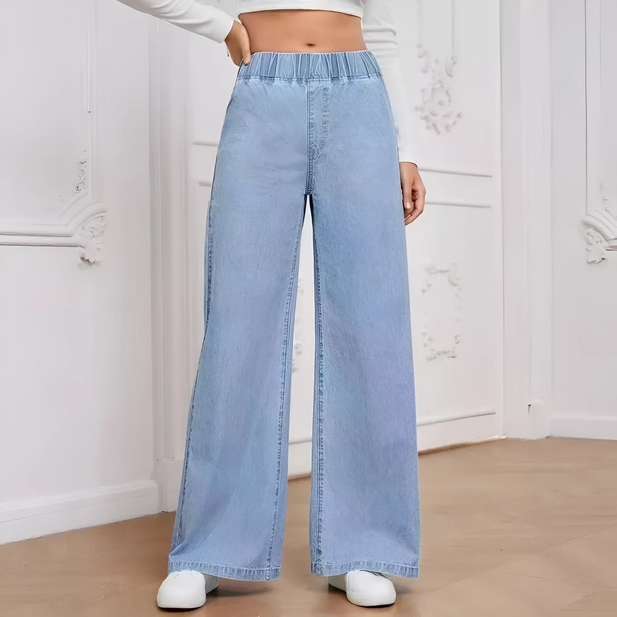 Plus size light blue washed straight-leg jeans with wide leg and mid waist