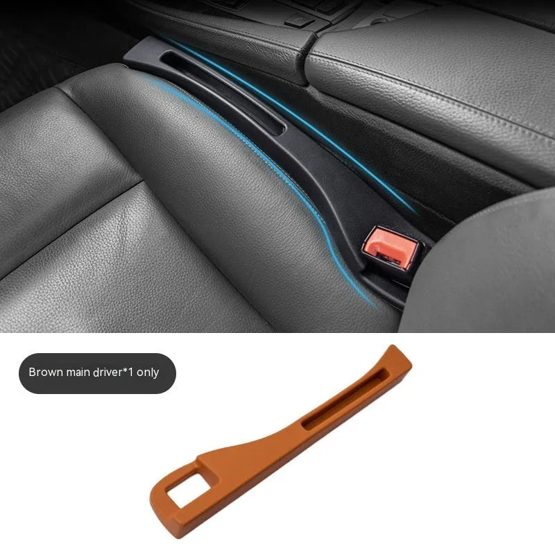 Black car gap storage box with handle placed between vehicle front seats