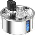 Stainless steel cat and dog water fountain with white heating base on a kitchen floor.
