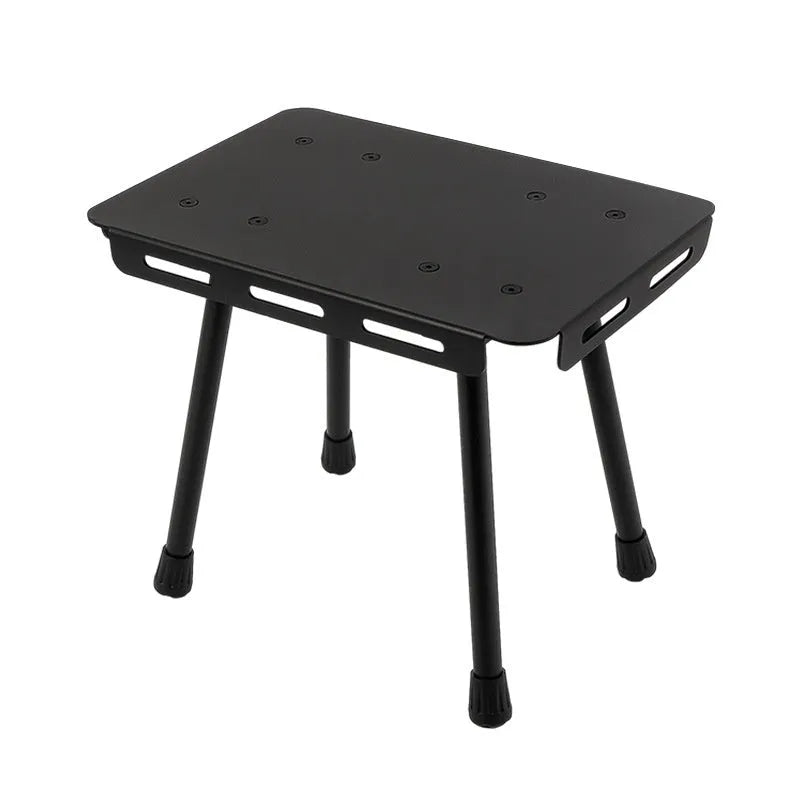 Aluminium dual-use folding camping stool that converts to a small table, shown with tactical storage bag.