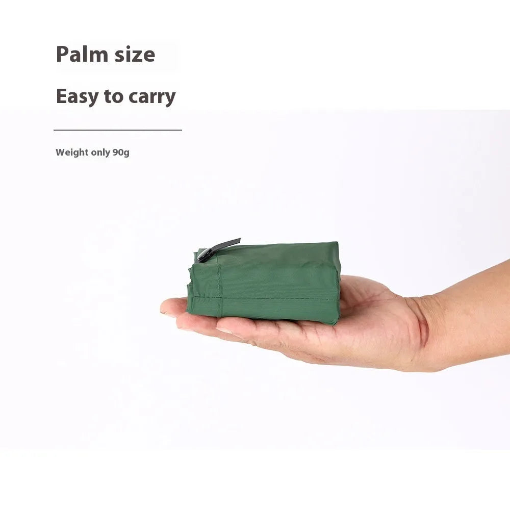 Inflatable camping cushion in 40D nylon TPU, 5x34x44cm, waterproof gasket, shown in six colours.