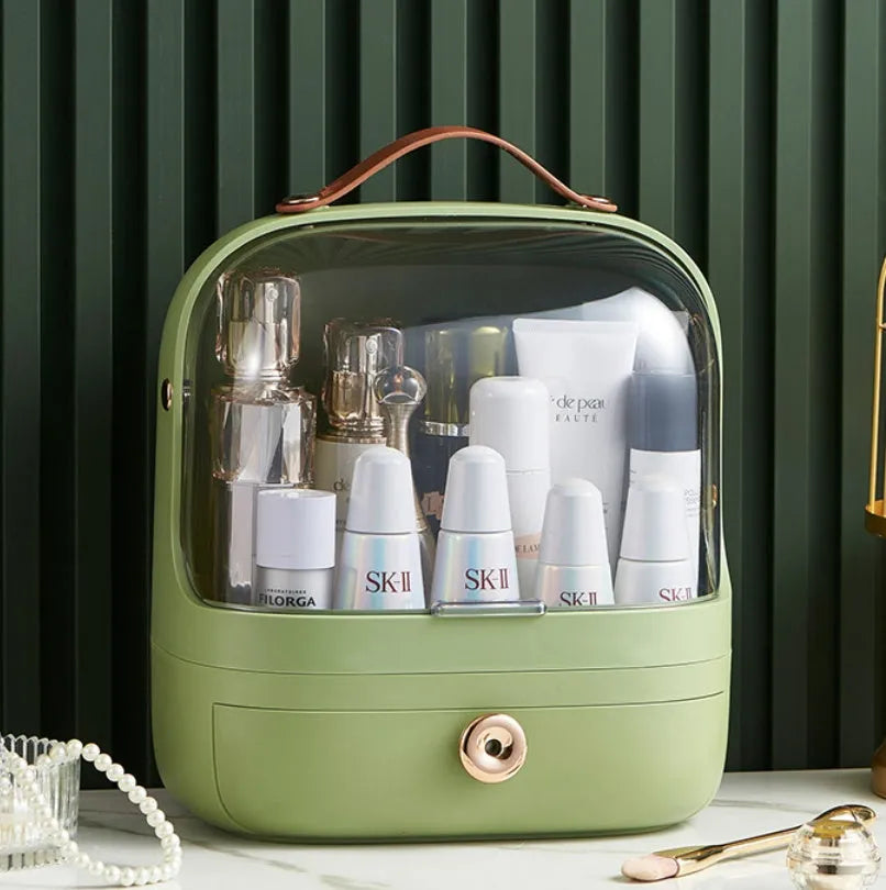 Desktop cosmetics storage box in PET hip material, dustproof, in green colour with lipsticks and blushes inside.
