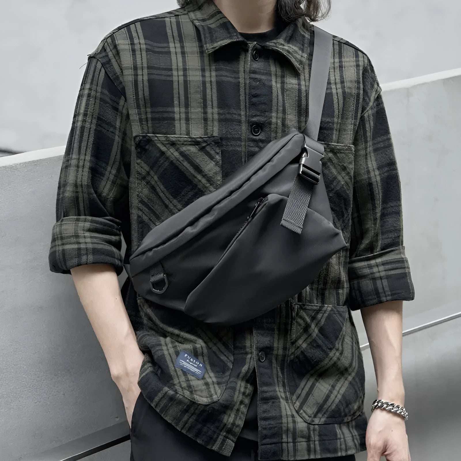 Black men's slanted chest bag made from Oxford fabric measuring 8 inches