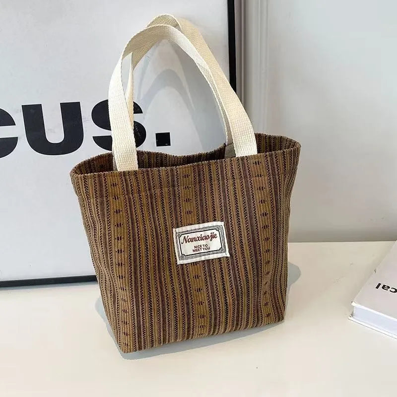 Japanese style corduroy shoulder tote handbag in dark brown colour showing textured fabric and large capacity design