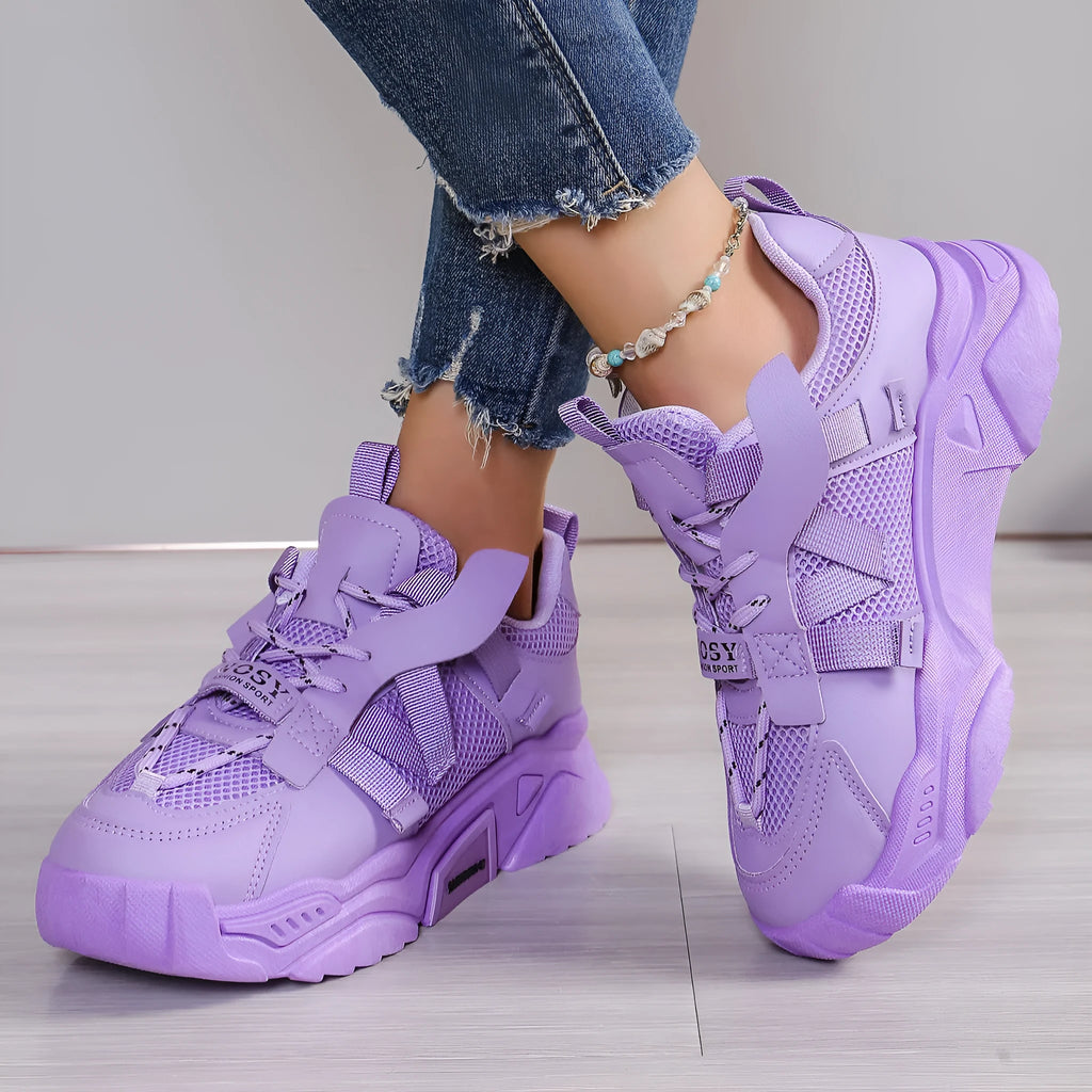 Women's purple platform mesh sports shoes with animal pattern detail and front lace-up closure