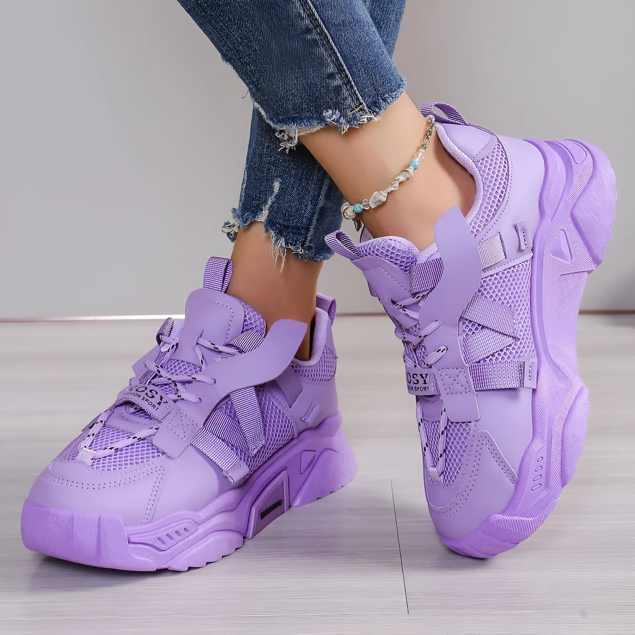 Women's purple platform mesh sports shoes with animal pattern detail and front lace-up closure