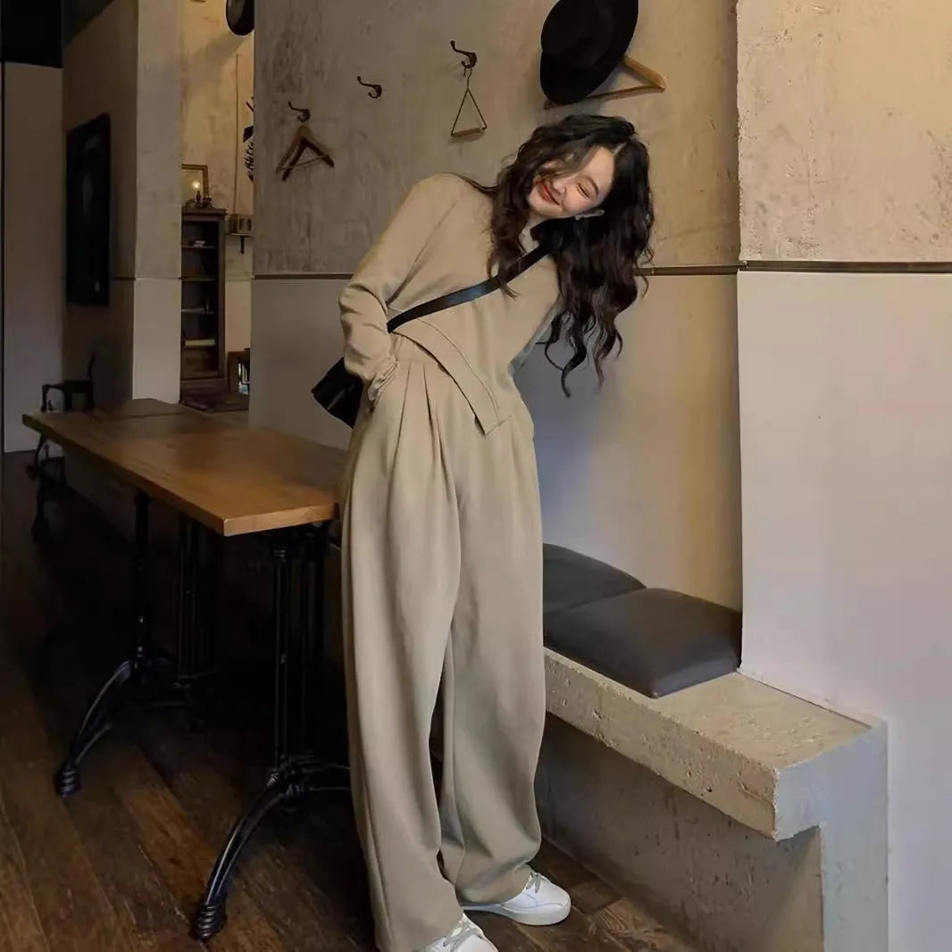 Women's khaki loose-fit casual sports suit with long sleeves and full-length trousers.