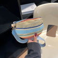 Women's straw beach shoulder bag with shell shape and single strap in blue colour