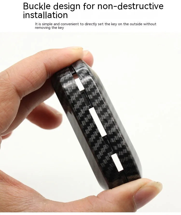 Fiat 500 Boyue Ottimo Viaggio carbon fibre design remote key case in black, red, and dark blue colours.
