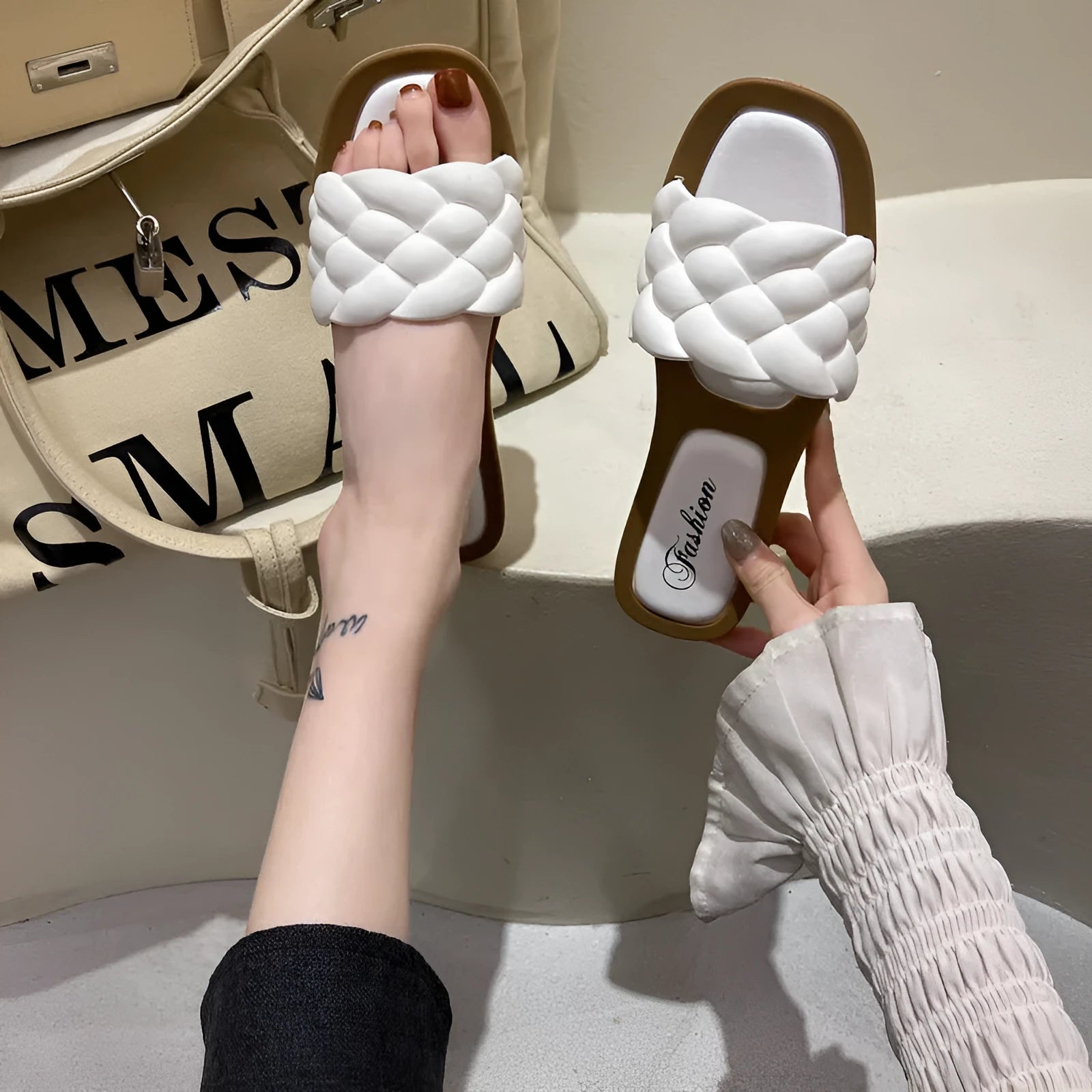 Women's PVC beach sandals with a thick non-slip sole in black, shown on a white background.