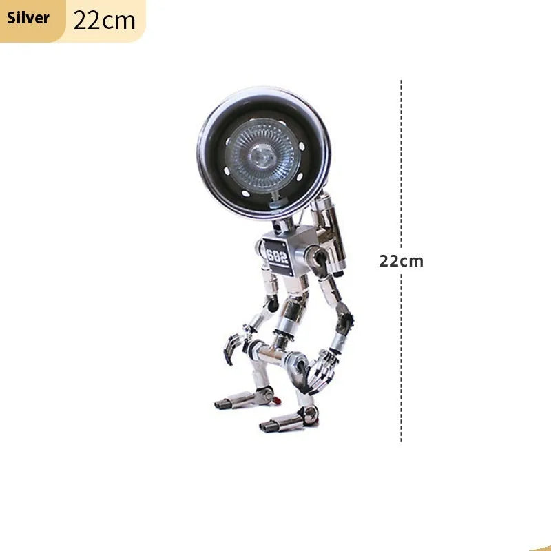 Creative silver or copper robot-shaped decorative desk lamp in 22cm or 29cm size.