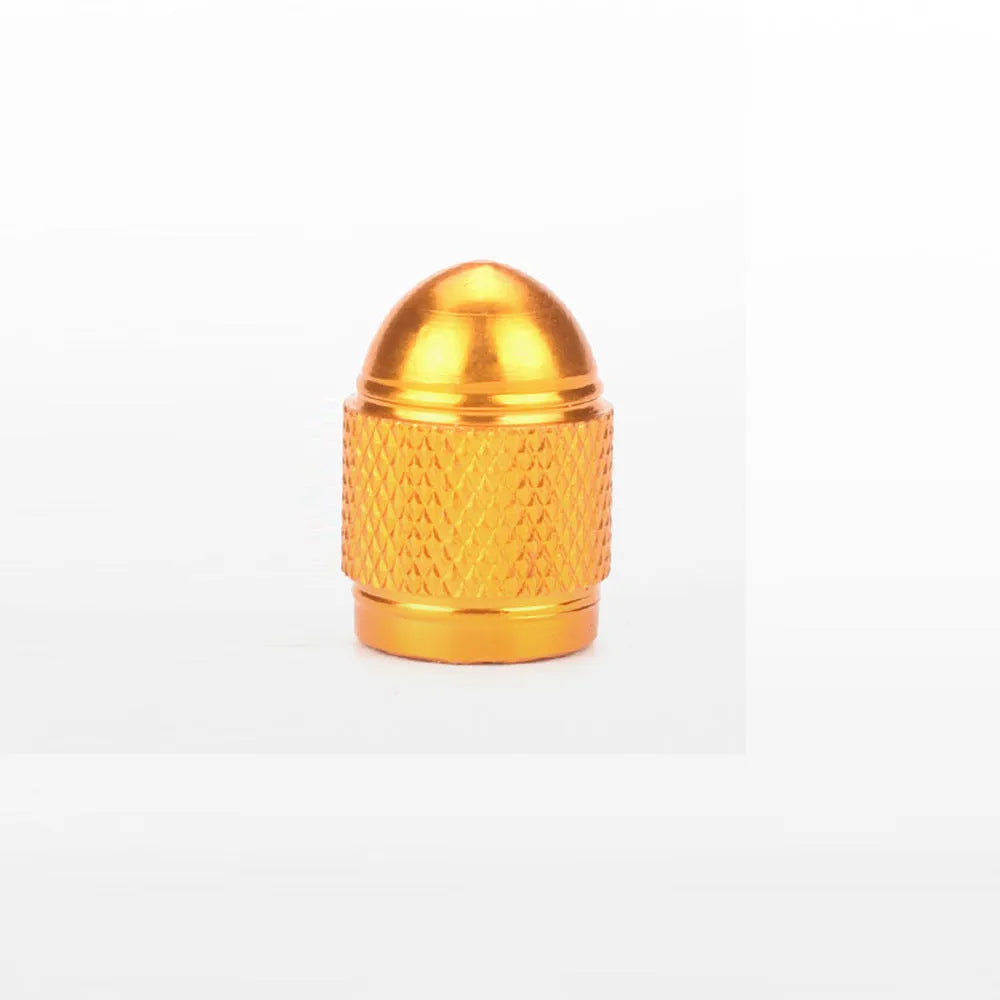 Aluminium mountain bike tyre valve cap in multiple colours on a Schrader valve.