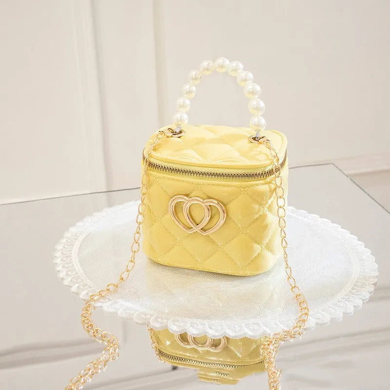 White heart-patterned PVC bucket gel bag for women showing bucket shape and heart design