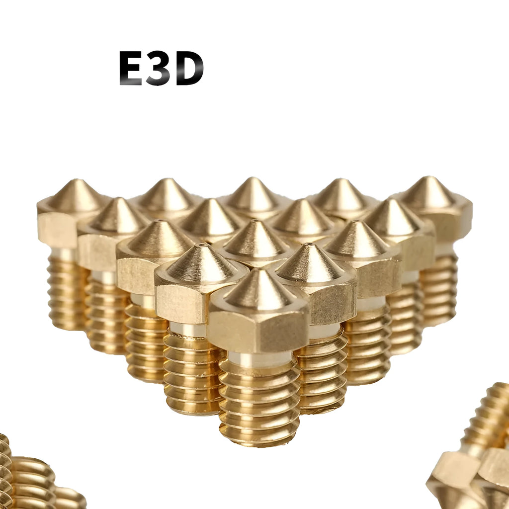 Close-up of a brass E3D-style 3D printer nozzle with M6 thread, showing its precise machining.