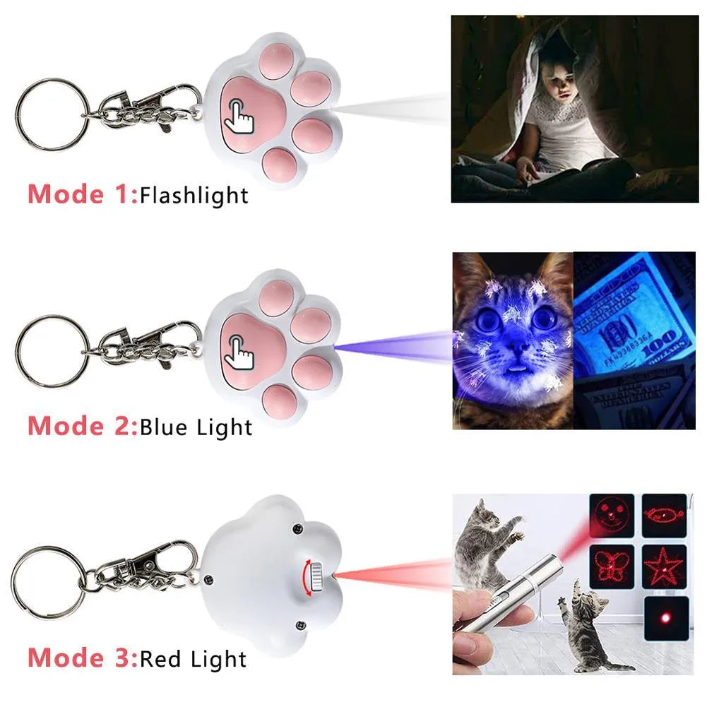 Pink and black infrared cat teaser key chain toy measuring 5cm by 2.5cm with USB charging port