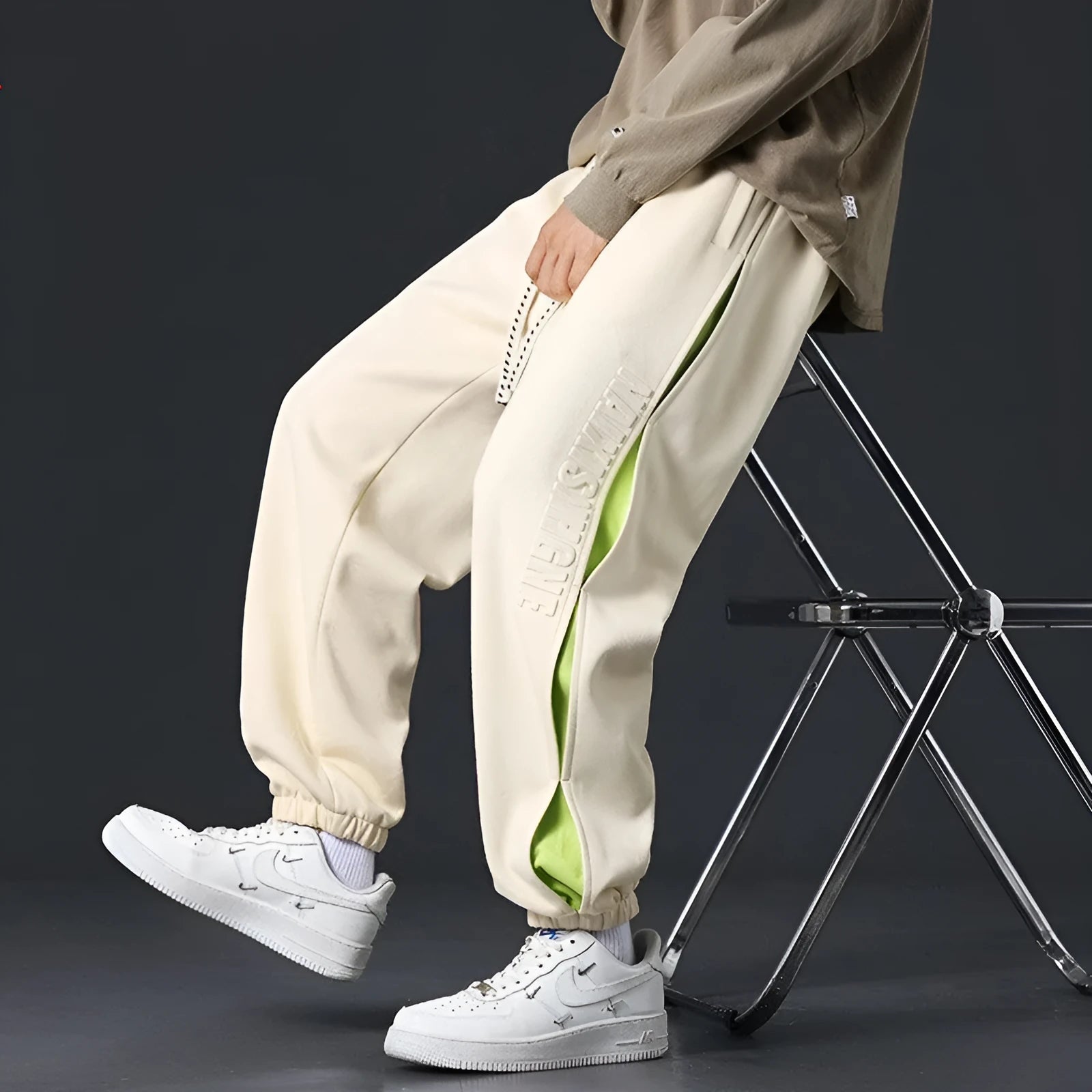 Men's black ankle banded trousers with stitching detail and cotton micro-elastic fabric