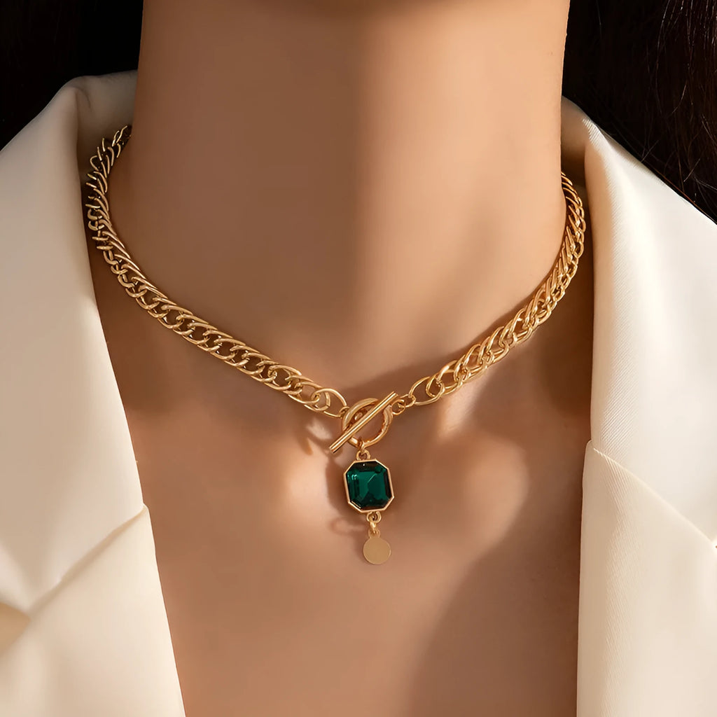 Gold electroplated titanium steel pendant necklace with geometric round pendant and Cuban link chain