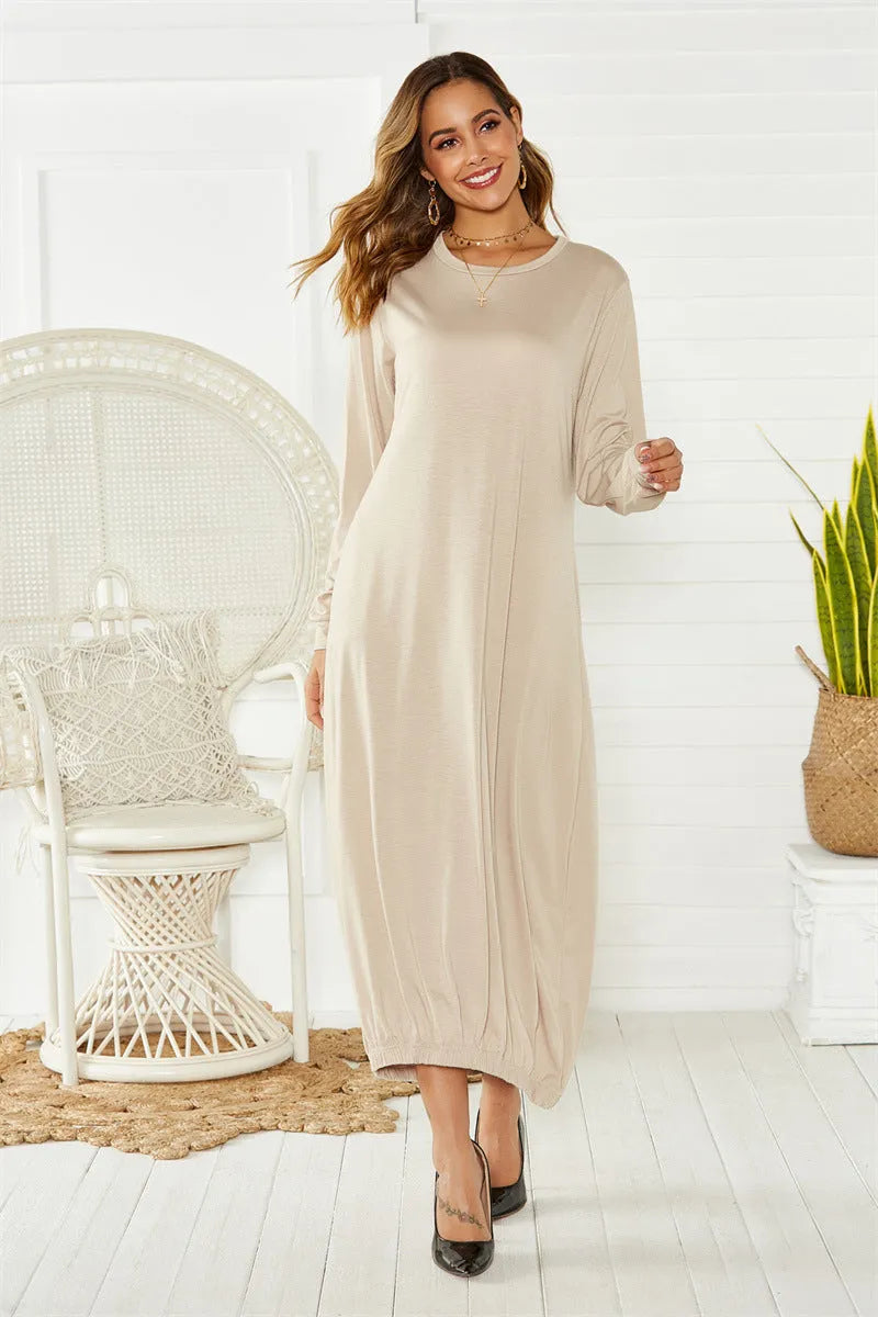 Women's black lantern dress with lace-up crew neck, loose casual silhouette, knitted polyester fabric.