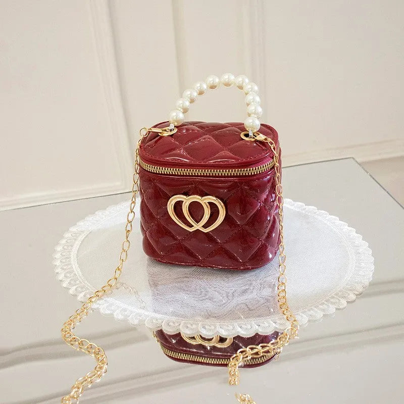 White heart-patterned PVC bucket gel bag for women showing bucket shape and heart design