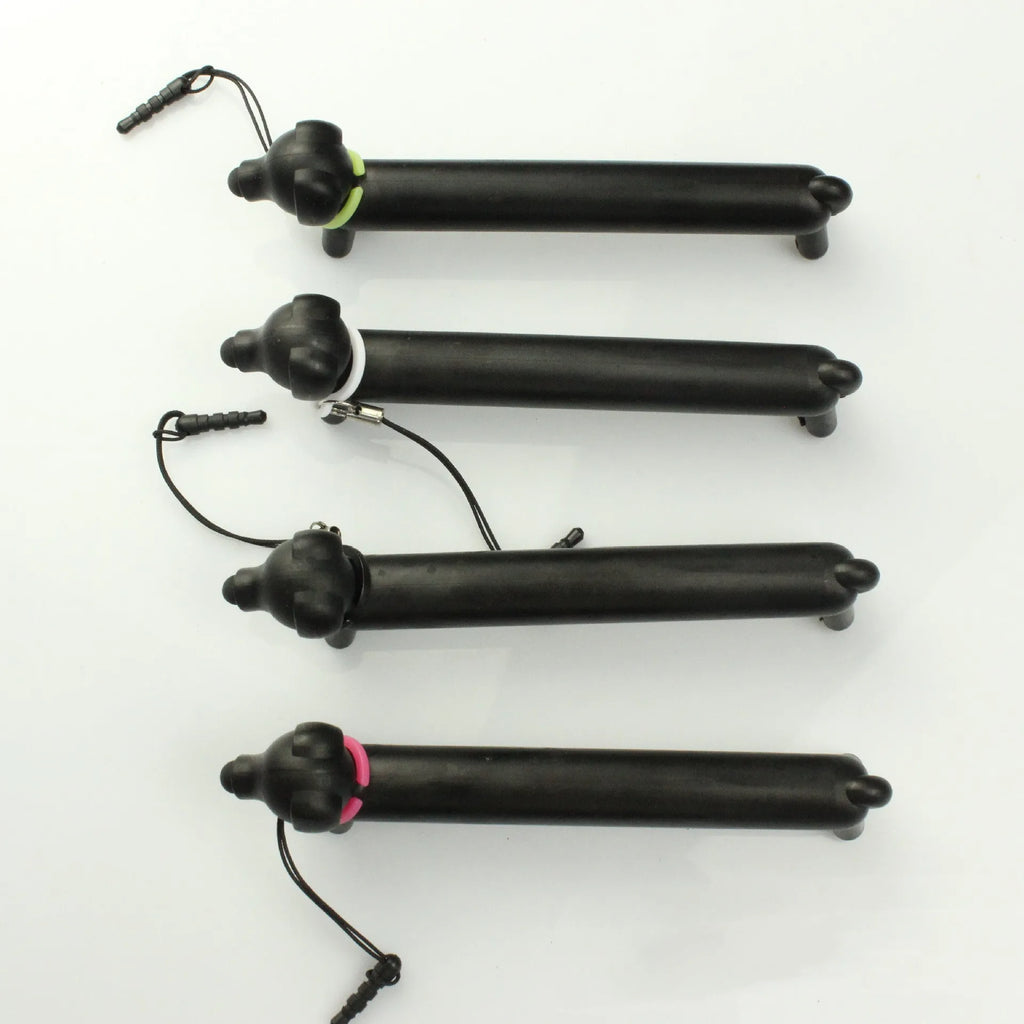 Black dog-shaped touch screen stylus with phone stand function on a white background
