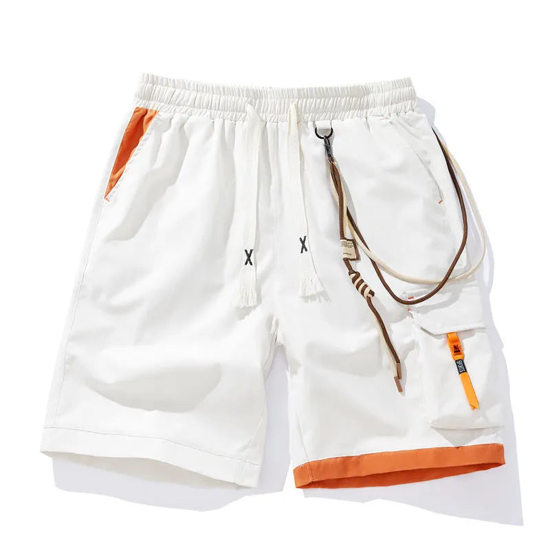 Man wearing coffee-coloured high-waisted bamboo fibre plus-size sports shorts with a loose, straight-leg fit.