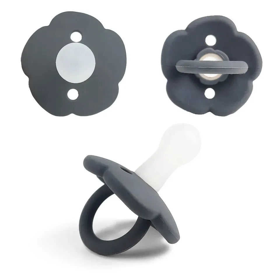 Baby pacifier with silicone lace nipple in 6.5x5x5cm size available in 11 colours for 0-6 months