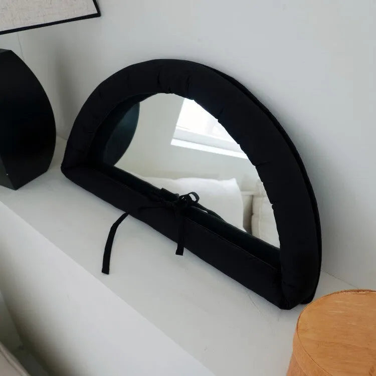 Hanging soft cotton-filled fabric mirror in solid colour for background use